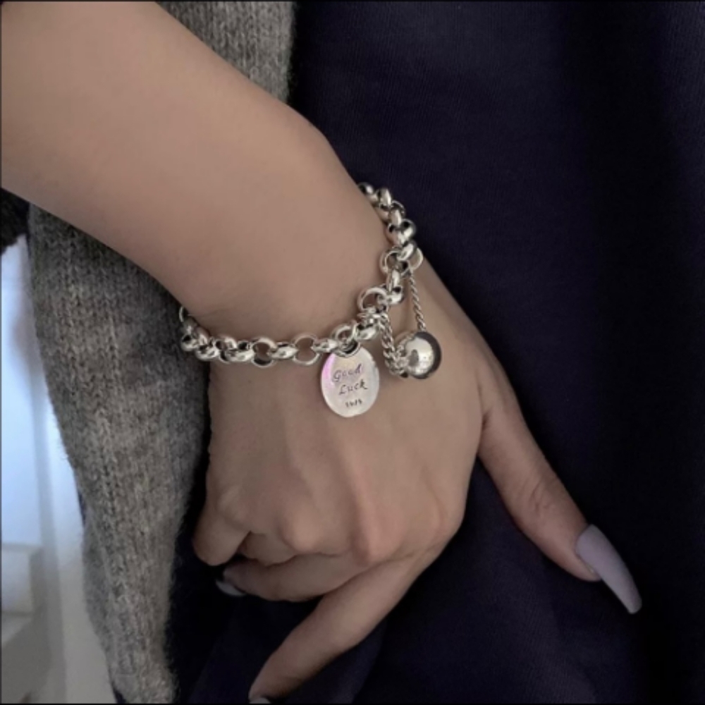 Sterling Silver Ball and Lucky Charm Bracelet. NWOT